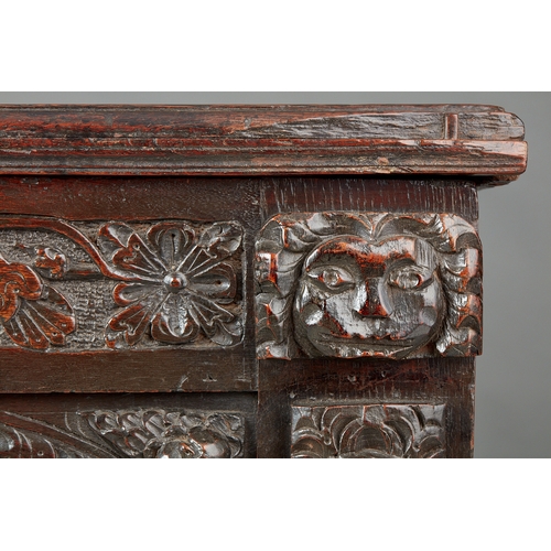 112 - A FINE AND RARE ELIZABETHAN OAK COFFER, BECKHAM WORKSHOP, SALISBURY, CIRCA 1580-1600. The twin plank... 