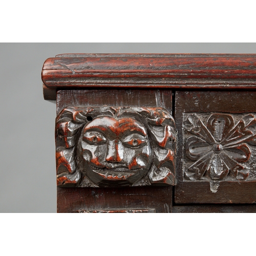 112 - A FINE AND RARE ELIZABETHAN OAK COFFER, BECKHAM WORKSHOP, SALISBURY, CIRCA 1580-1600. The twin plank... 