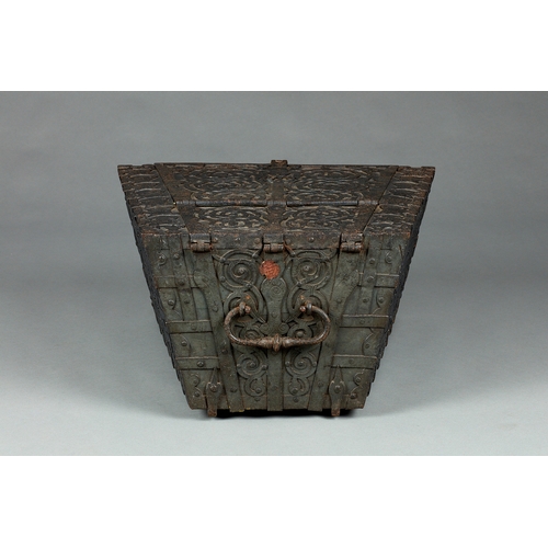 114 - A RARE AND DOCUMENTED TUDOR IRON BOUND OAK TRAPEZIUM SHAPED STRONG BOX, ANGLO/FLEMISH, CORBY CASTLE,... 