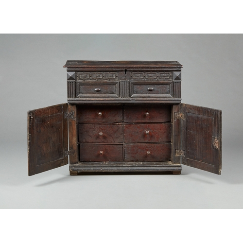 15 - A RARE ELIZABETHAN OAK BOX TOP CABINET OF DRAWERS, WEST COUNTRY, EXETER, CIRCA 1580-1600. A rare and... 