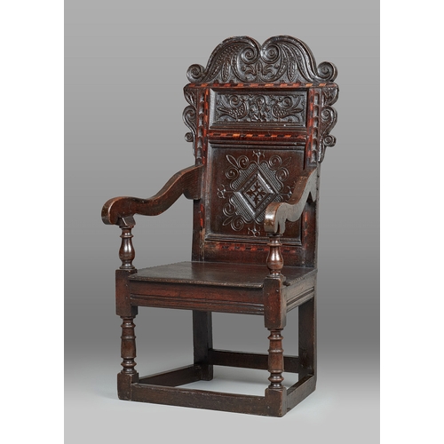 16 - A RARE CHARLES II OAK AND INLAID ARMCHAIR, LEEDS/HALIFAX, YORKSHIRE, CIRCA 16601670. A fine and rar... 