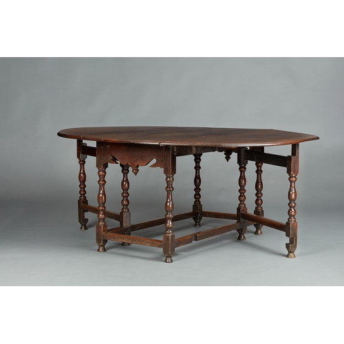 17 - A LARGE WILLIAM AND MARY OAK GATELEG DINING TABLE TO SEAT TEN PEOPLE, ENGLISH, CIRCA 1685-1700. Havi... 