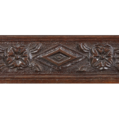 19 - A CHARLES I INLAID OAK CANTED CUPBOARD, YORKSHIRE, LEEDS/HALIFAX, CIRCA 1630. The plank top above ra... 