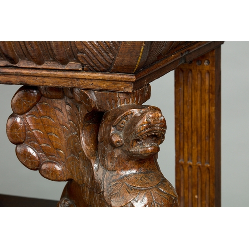 32 - A RARE ELIZABETHAN OAK THREE TIER BUFFET WITH QUADRUPLE GRIFFIN SUPPORTS, HOME COUNTIES, CIRCA 1570-... 