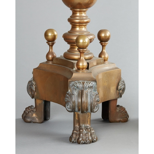 37 - A PAIR OF 18TH CENTURY TRAPEZOID BRASS ANDIRONS, CIRCA 1800. Each with a stem topped by a prominent ... 