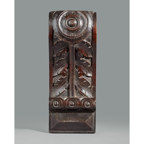 40 - A GROUP OF THREE ELIZABETHAN CARVED OAK CORBELS, CIRCA 1590. The corbels boldly carved with a Lion m... 