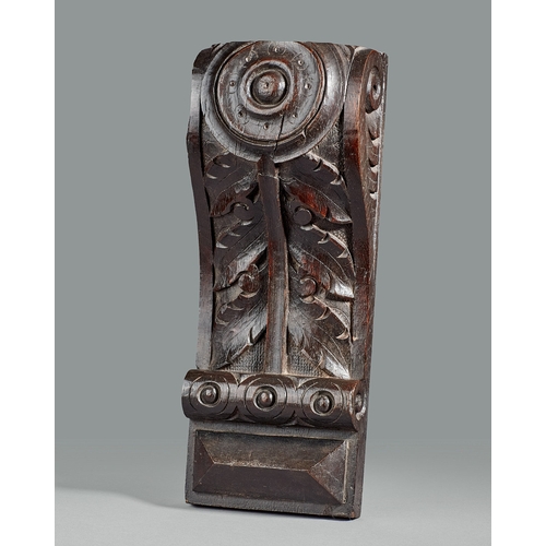 40 - A GROUP OF THREE ELIZABETHAN CARVED OAK CORBELS, CIRCA 1590. The corbels boldly carved with a Lion m... 