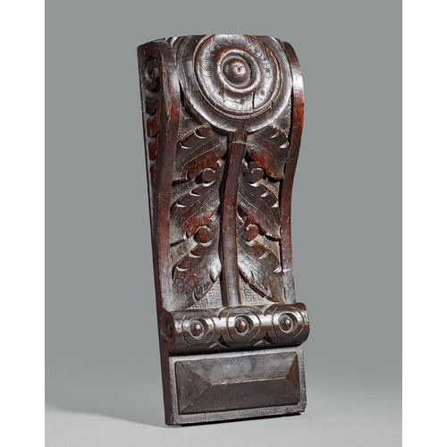 40 - A GROUP OF THREE ELIZABETHAN CARVED OAK CORBELS, CIRCA 1590. The corbels boldly carved with a Lion m... 