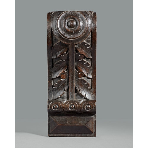 40 - A GROUP OF THREE ELIZABETHAN CARVED OAK CORBELS, CIRCA 1590. The corbels boldly carved with a Lion m... 