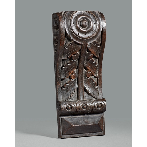 40 - A GROUP OF THREE ELIZABETHAN CARVED OAK CORBELS, CIRCA 1590. The corbels boldly carved with a Lion m... 