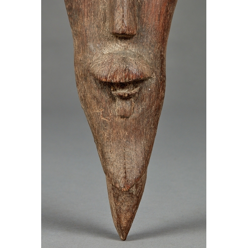 45 - A UNIQUE 19TH CENTURY FOLK ART OAK MUSHROOM HEAD, CIRCA 18501880. The elongated carving of a face... 