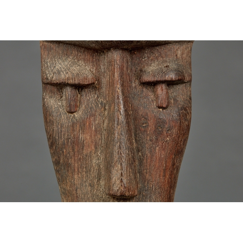 45 - A UNIQUE 19TH CENTURY FOLK ART OAK MUSHROOM HEAD, CIRCA 18501880. The elongated carving of a face... 