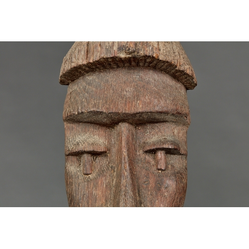 45 - A UNIQUE 19TH CENTURY FOLK ART OAK MUSHROOM HEAD, CIRCA 18501880. The elongated carving of a face... 