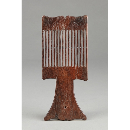 49 - A RARE GEORGE II OAK TREEN TAPE LOOM OR WEAVING PADDLE, INSCRIBED AND DATED AF 1754. The hand-he... 