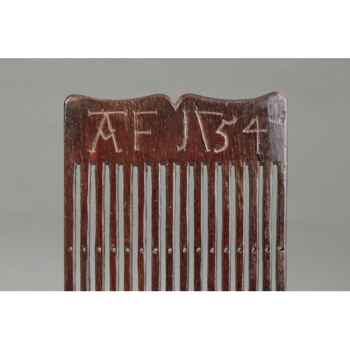 49 - A RARE GEORGE II OAK TREEN TAPE LOOM OR WEAVING PADDLE, INSCRIBED AND DATED AF 1754. The hand-he... 