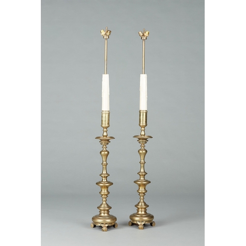 55 - A PAIR OF LATE 18TH/EARLY 19TH CENTURY TALL BRASS ALTAR CANDLESTICKS, CIRCA 1790-1800. The deep sock... 