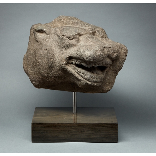 57 - A MID 15TH CENTURY GRITSTONE HEAD OF A LEOPARD, ENGLISH, STAFFORDSHIRE, CIRCA 1450-1460. A threequar... 