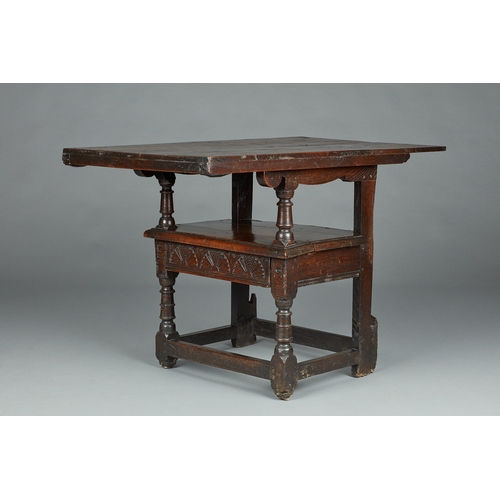 63 - A RARE MID 17TH CENTURY OAK TABLE CHAIR, SOUTH LANCASHIRE/CHESHIRE, CIRCA 1640-1660. The twin board ... 