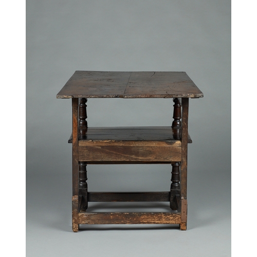 63 - A RARE MID 17TH CENTURY OAK TABLE CHAIR, SOUTH LANCASHIRE/CHESHIRE, CIRCA 1640-1660. The twin board ... 