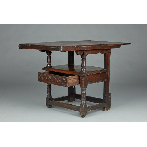 63 - A RARE MID 17TH CENTURY OAK TABLE CHAIR, SOUTH LANCASHIRE/CHESHIRE, CIRCA 1640-1660. The twin board ... 