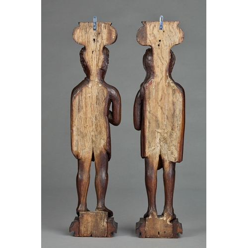 64 - AN IMPORTANT AND LARGE PAIR OF ELIZABETHAN OAK CARYATID AND ATLANTA FIGURAL TERMS, ENGLISH, CIRCA 15... 