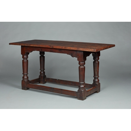 69 - EXCEPTIONALLY RARE LATE ELIZABETHAN/JAMES I YEW TABLE, ENGLISH, CIRCA 1590-1610. The three plank cle... 