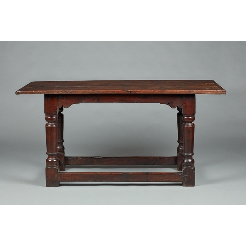 69 - EXCEPTIONALLY RARE LATE ELIZABETHAN/JAMES I YEW TABLE, ENGLISH, CIRCA 1590-1610. The three plank cle... 