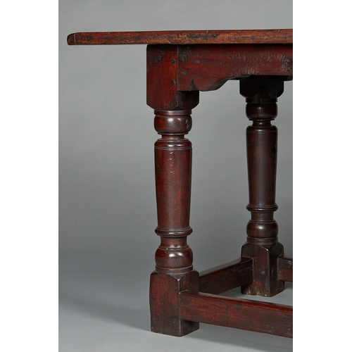 69 - EXCEPTIONALLY RARE LATE ELIZABETHAN/JAMES I YEW TABLE, ENGLISH, CIRCA 1590-1610. The three plank cle... 