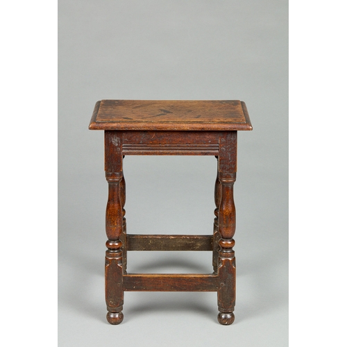 72 - A FINE QUALITY WILLIAM AND MARY OAK JOINED STOOL, ENGLISH, CIRCA 16901700. The heavily moulded thic... 