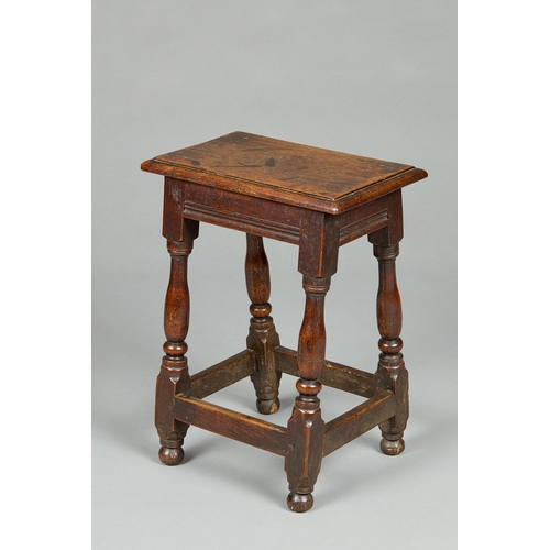 72 - A FINE QUALITY WILLIAM AND MARY OAK JOINED STOOL, ENGLISH, CIRCA 16901700. The heavily moulded thic... 