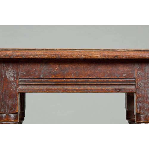 72 - A FINE QUALITY WILLIAM AND MARY OAK JOINED STOOL, ENGLISH, CIRCA 16901700. The heavily moulded thic... 