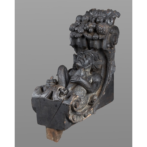 73 - A PAIR OF ELIZABETH I OAK CORBELS CARVED WITH GROTESQUE SATYRS, CIRCA 1580-1600. Originally Jetty su... 