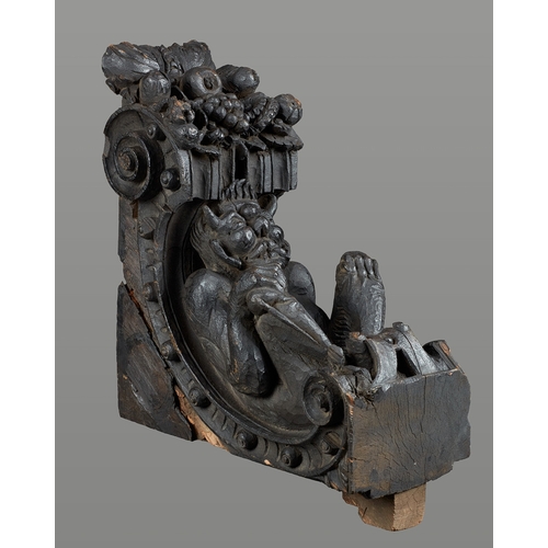 73 - A PAIR OF ELIZABETH I OAK CORBELS CARVED WITH GROTESQUE SATYRS, CIRCA 1580-1600. Originally Jetty su... 