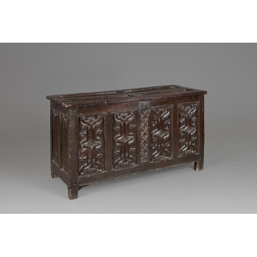 79 - A FINE AND EXTREMELY RARE ENGLISH HENRY VIII OAK PARCHEMIN-CARVED COFFER. CIRCA 1530. The hinged lid... 