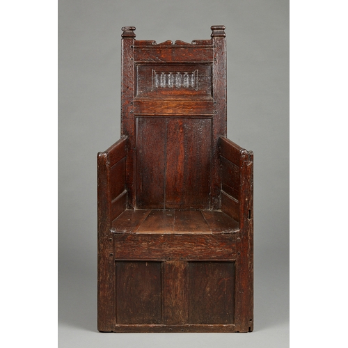 80 - AN INCREDIBLY RARE TUDOR HENRY VII/HENRY VIII OAK ENCLOSED ARMCHAIR, ENGLISH, CIRCA 1500-1530. The p... 