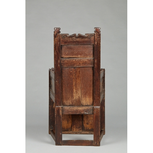 80 - AN INCREDIBLY RARE TUDOR HENRY VII/HENRY VIII OAK ENCLOSED ARMCHAIR, ENGLISH, CIRCA 1500-1530. The p... 