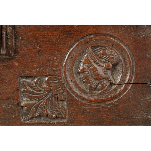 81 - A RARE SMALL TUDOR OAK ROMAYNE CARVED BOARDED COFFER, HENRY VIII, CIRCA 15301540. The rare English ... 