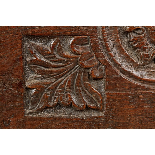 81 - A RARE SMALL TUDOR OAK ROMAYNE CARVED BOARDED COFFER, HENRY VIII, CIRCA 15301540. The rare English ... 