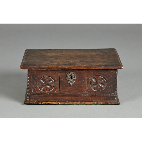 83 - A SMALL CHARLES II ELM DOCUMENTS BOX, CIRCA 1660-1670. The single plank chamfered lid above a front ... 