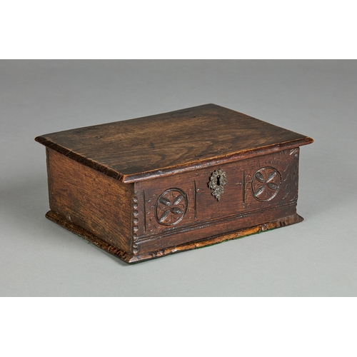 83 - A SMALL CHARLES II ELM DOCUMENTS BOX, CIRCA 1660-1670. The single plank chamfered lid above a front ... 