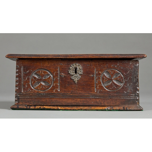 83 - A SMALL CHARLES II ELM DOCUMENTS BOX, CIRCA 1660-1670. The single plank chamfered lid above a front ... 