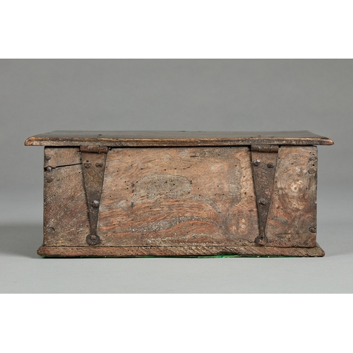 83 - A SMALL CHARLES II ELM DOCUMENTS BOX, CIRCA 1660-1670. The single plank chamfered lid above a front ... 