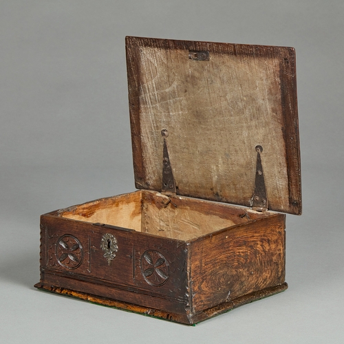 83 - A SMALL CHARLES II ELM DOCUMENTS BOX, CIRCA 1660-1670. The single plank chamfered lid above a front ... 