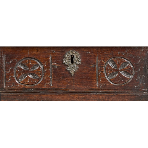 83 - A SMALL CHARLES II ELM DOCUMENTS BOX, CIRCA 1660-1670. The single plank chamfered lid above a front ... 