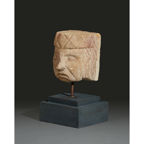 84 - A MEDIEVAL 14TH TO 15TH CENTURY MAYAN SANDSTONE HEAD, CIRCA 1380-1480. The red and cream sandstone h... 