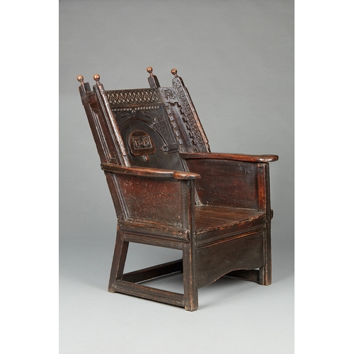 87 - A RARE AND UNIQUE LATE ELIZABETHAN - JAMES I OAK AND POLYCHROME, SLOPED BACK ENCLOSED ARMCHAIR, DERB... 