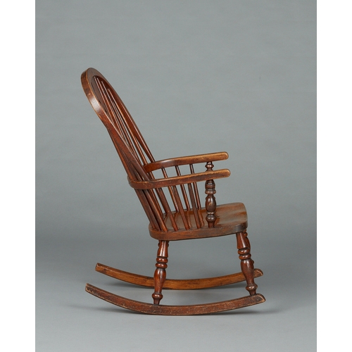 89 - A MID TO LATE 19TH CENTURY ASH AND ELM WINDSOR ROCKING CHAIR, CIRCA 1850-1880. A mid-sized Windsor r... 