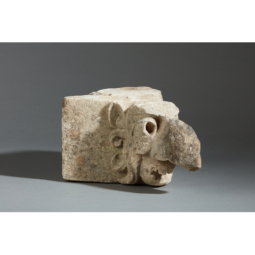 92 - A MID 15TH CENTURY PAIR OF LIMESTONE BEAKED GROTESQUES, ENGLISH, CIRCA 1400-1450. Carved in high rel... 