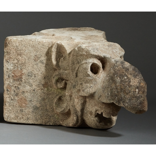 92 - A MID 15TH CENTURY PAIR OF LIMESTONE BEAKED GROTESQUES, ENGLISH, CIRCA 1400-1450. Carved in high rel... 