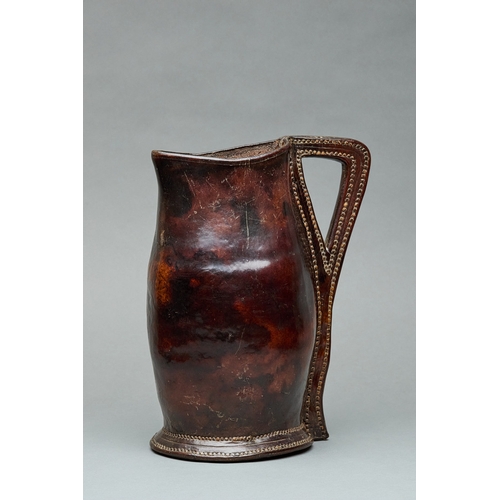 94 - A MID TO LATE 17TH CENTURY LEATHER BLACKJACK ALE JUG, ENGLISH, CIRCA 1660-1680. A finely shaped leat... 